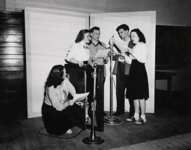 1948—Students read from a script in a KWSC studio