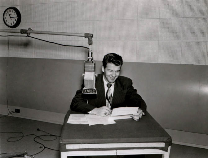 1955—Freshman student Winston F. McKracken was moderator for the weekly KWSC city government program “City Hall”